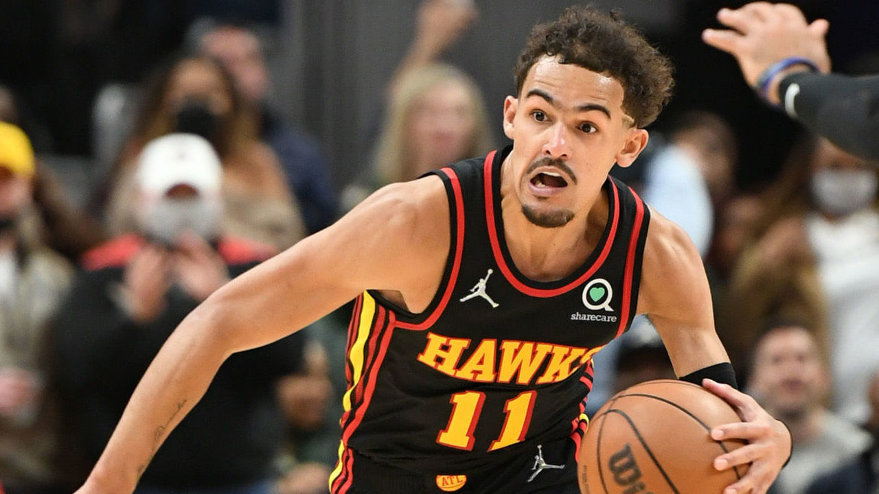 ATLANTA, GA - JANUARY 21: Trae Young #11 of the Atlanta Hawks dribbles the ball during the game against the Miami Heat on January 21, 2022 at State Farm Arena in Atlanta, Georgia. NOTE TO USER: User expressly acknowledges and agrees that, by downloading and/or using this Photograph, user is consenting to the terms and conditions of the Getty Images License Agreement. Mandatory Copyright Notice: Copyright 2022 NBAE