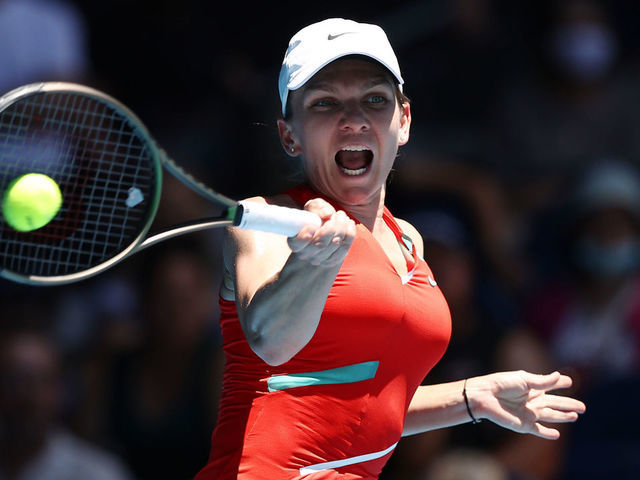 MELBOURNE, AUSTRALIA - JANUARY 22: Simona Halep of Romania plays a forehand in her third round singles match against Danika Kovinic of Montenegro during day six of the 2022 Australian Open at Melbourne Park on January 22, 2022 in Melbourne, Australia.