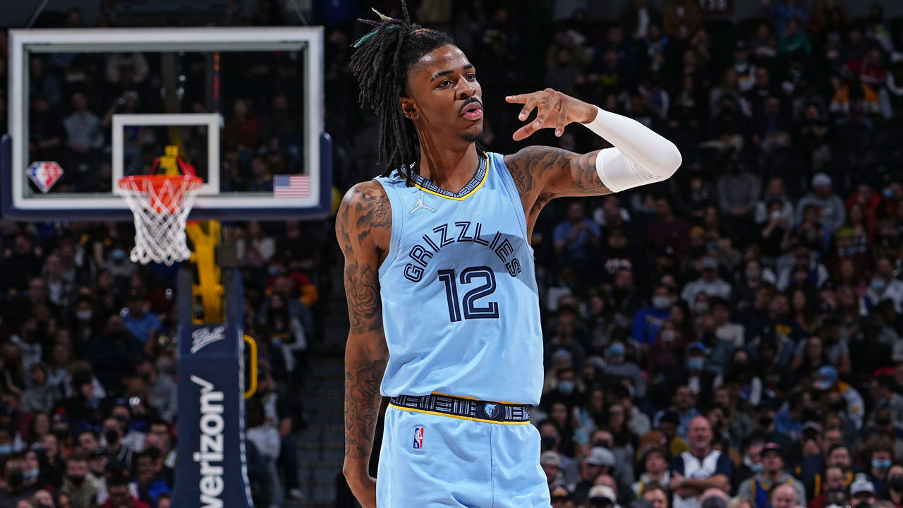 DENVER, CO - JANUARY 21: Ja Morant #12 of the Memphis Grizzlies reacts during a game against the Denver Nuggets on January 21, 2022 at the Ball Arena in Denver, Colorado. NOTE TO USER: User expressly acknowledges and agrees that, by downloading and/or using this Photograph, user is consenting to the terms and conditions of the Getty Images License Agreement. Mandatory Copyright Notice: Copyright 2022 NBAE