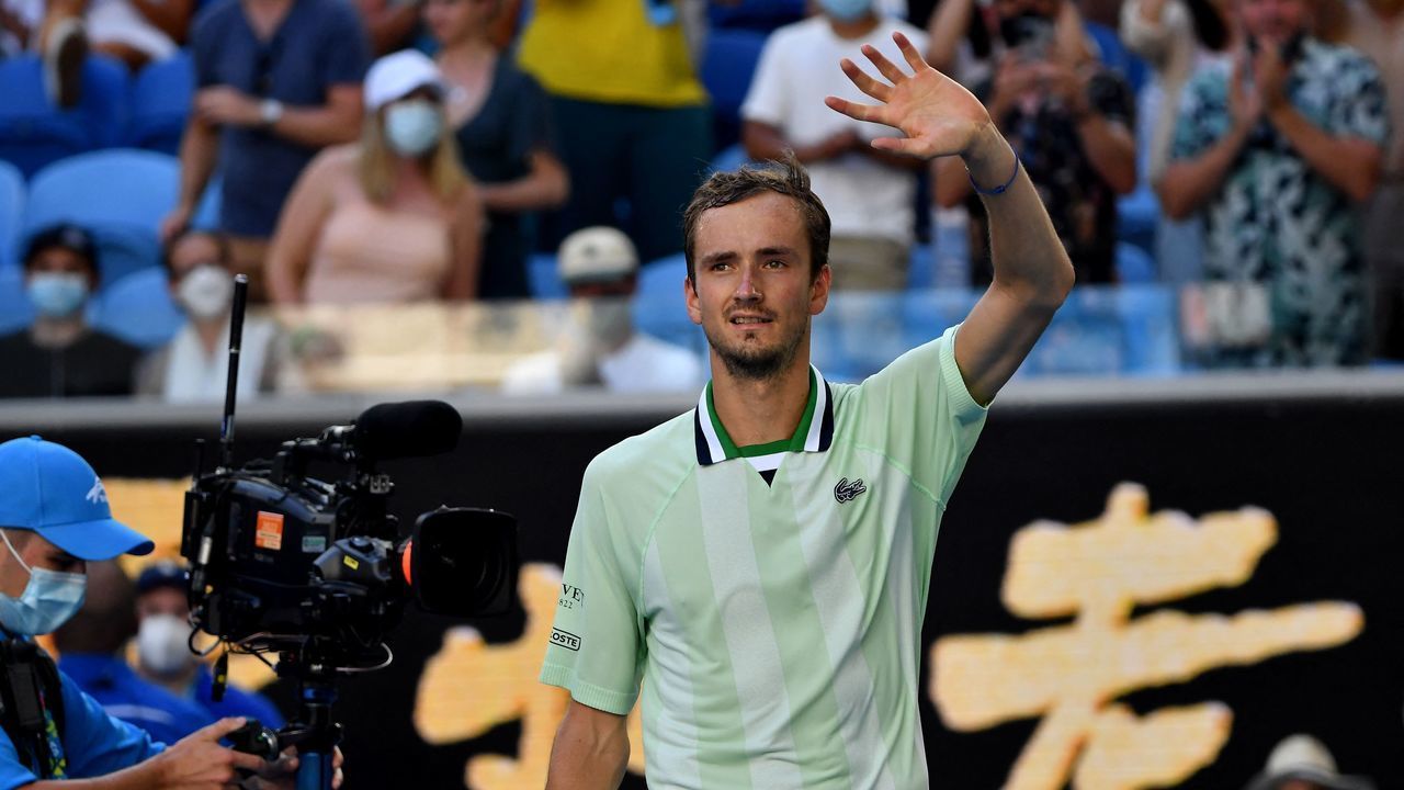 Russia's Daniil Medvedev celebrates after victory against Netherlands' Botic Van de Zandschulp during their men's singles match on day six of the Australian Open tennis tournament in Melbourne on January 22, 2022. - -- IMAGE RESTRICTED TO EDITORIAL USE - STRICTLY NO COMMERCIAL USE --