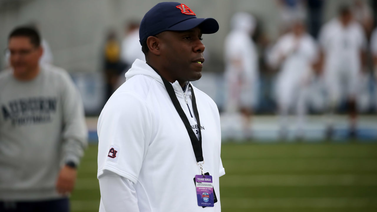 BIRMINGHAM, AL - DECEMBER 28: Auburn Tigers defensive coordinator Derek Mason watches warm ups before the TicketSmarter Birmingham Bowl between the Houston Cougars and the Auburn Tigers on December 28, 2021 at Protective Stadium in Birmingham, Alabama.