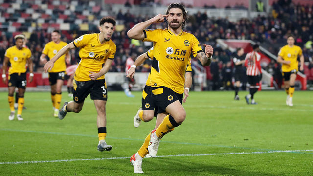 BRENTFORD, ENGLAND - JANUARY 22: Ruben Neves of Wolverhampton Wanderers celebrates after scoring his team's second goal during the Premier League match between Brentford and Wolverhampton Wanderers at Brentford Community Stadium on January 22, 2022 in Brentford, England.