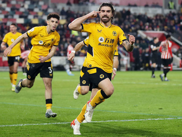 BRENTFORD, ENGLAND - JANUARY 22: Ruben Neves of Wolverhampton Wanderers celebrates after scoring his team's second goal during the Premier League match between Brentford and Wolverhampton Wanderers at Brentford Community Stadium on January 22, 2022 in Brentford, England.