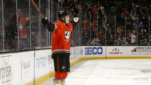 ANAHEIM, CA - DECEMBER 17: Trevor Zegras #46 of the Anaheim Ducks celebrates a goal during the game against the Arizona Coyotes at Honda Center on December 17, 2021 in Anaheim, California.