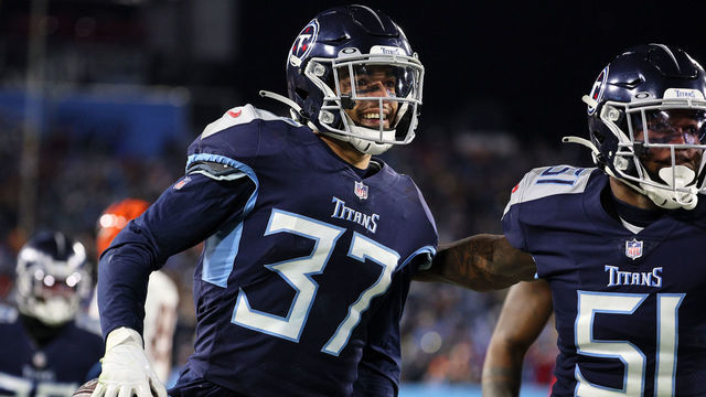NASHVILLE, TENNESSEE - JANUARY 22: Safety Amani Hooker #37 of the Tennessee Titans celebrates after intercepting a Cincinnati Bengals pass in the second half during the AFC Divisional Playoff game at Nissan Stadium on January 22, 2022 in Nashville, Tennessee.