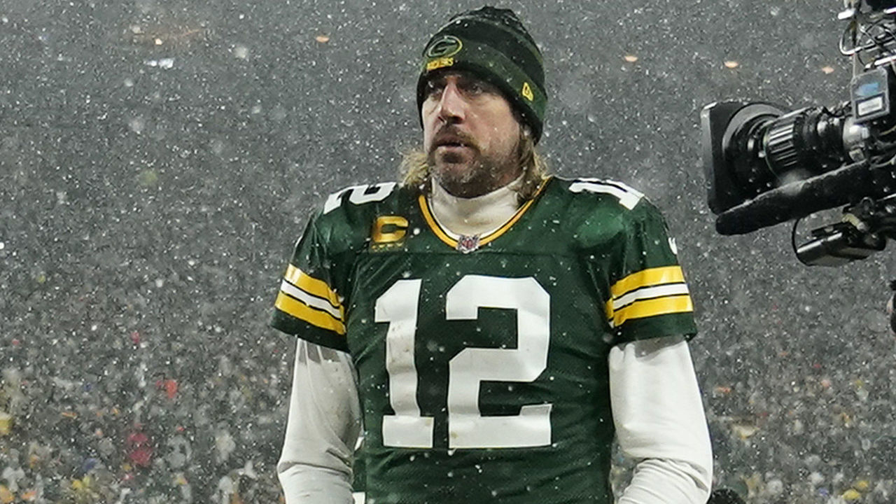 GREEN BAY, WISCONSIN - JANUARY 22: Quarterback Aaron Rodgers #12 of the Green Bay Packers exits the field after losing the NFC Divisional Playoff game to the San Francisco 49ers at Lambeau Field on January 22, 2022 in Green Bay, Wisconsin.