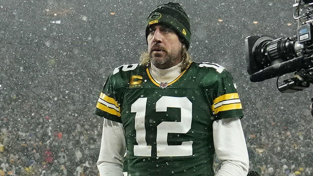 GREEN BAY, WISCONSIN - JANUARY 22: Quarterback Aaron Rodgers #12 of the Green Bay Packers exits the field after losing the NFC Divisional Playoff game to the San Francisco 49ers at Lambeau Field on January 22, 2022 in Green Bay, Wisconsin.