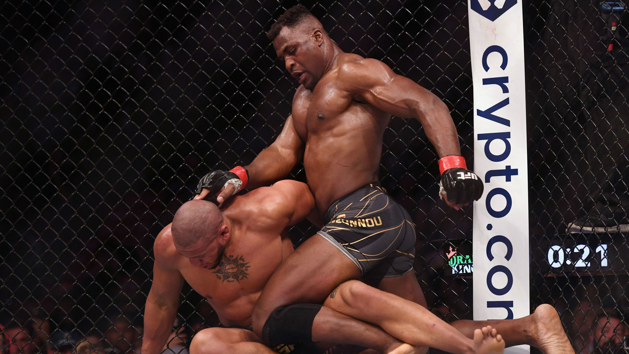 Anaheim , CA - January 22: UFC Heavyweight Champion Francis Ngannou (red gloves) battles Ciryl Gane (blue gloves) during UFC 270 at the Honda Center in Anaheim, CA. Saturday, Jan 22, 2022. Ngannou defeated Gane by decision to remain champion.