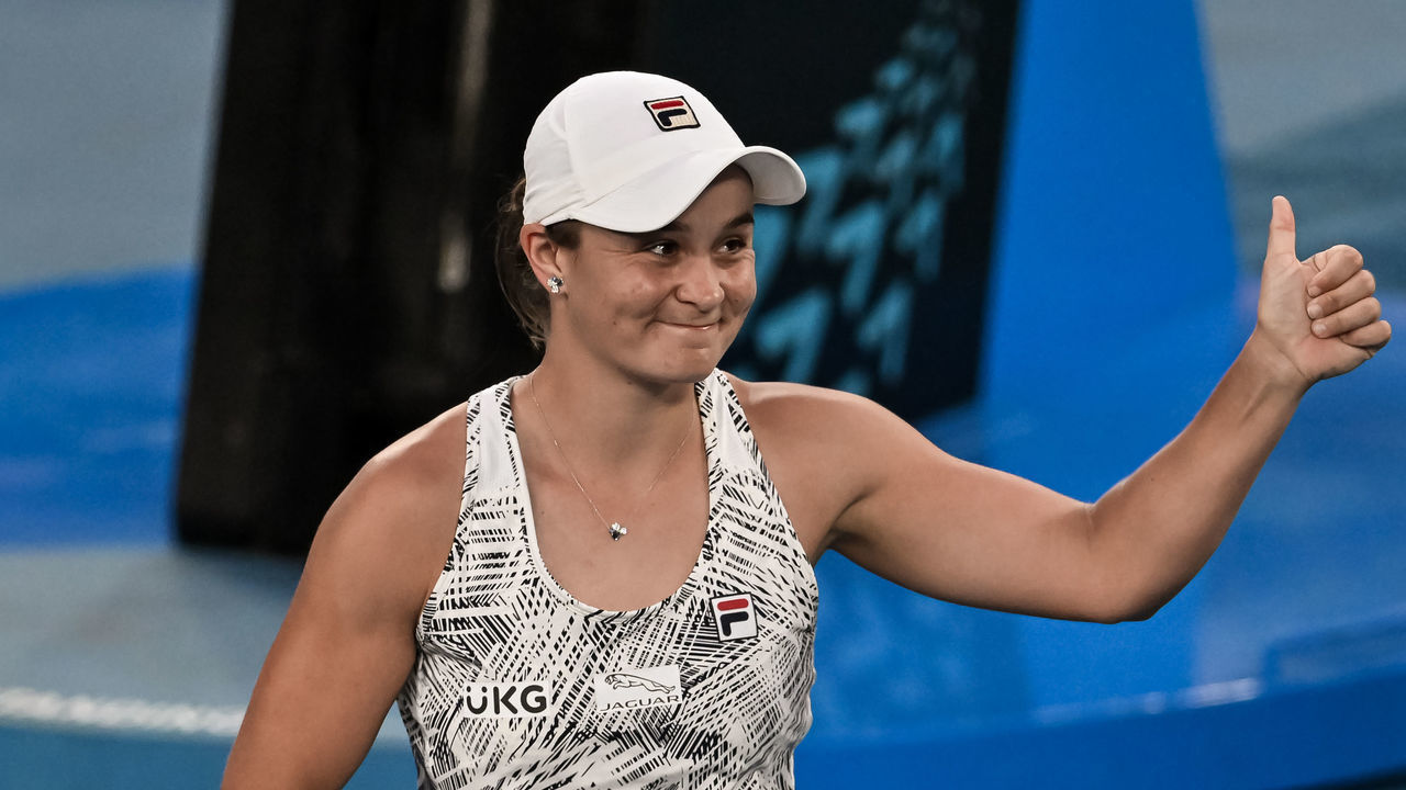 MELBOURNE, AUSTRALIA - JANUARY 23: Ashleigh Barty of Australia celebrates her victory over Amanda Anisimova of the United States during day seven of the 2022 Australian Open at Melbourne Park on January 23, 2022 in Melbourne, Australia.