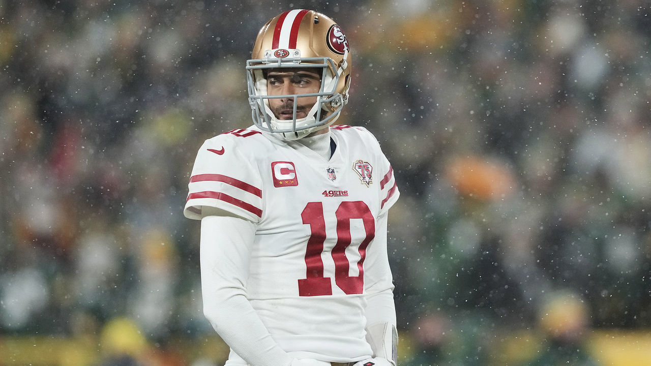 GREEN BAY, WISCONSIN - JANUARY 22: Quarterback Jimmy Garoppolo #10 of the San Francisco 49ers looks toward the sidelines during the 4th quarter of the NFC Divisional Playoff game against the Green Bay Packers at Lambeau Field on January 22, 2022 in Green Bay, Wisconsin.