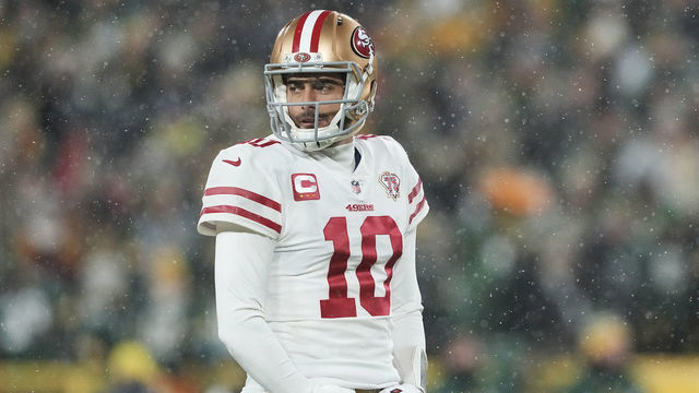 GREEN BAY, WISCONSIN - JANUARY 22: Quarterback Jimmy Garoppolo #10 of the San Francisco 49ers looks toward the sidelines during the 4th quarter of the NFC Divisional Playoff game against the Green Bay Packers at Lambeau Field on January 22, 2022 in Green Bay, Wisconsin.