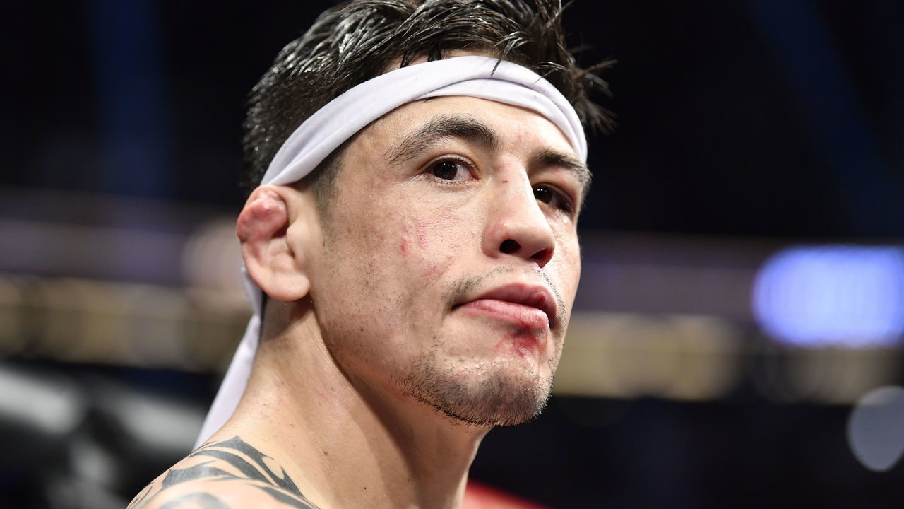 ANAHEIM, CALIFORNIA - JANUARY 22: Brandon Moreno of Mexico reacts after his decision loss to Deiveson Figueiredo of Brazil in their UFC flyweight championship fight during the UFC 270 event at Honda Center on January 22, 2022 in Anaheim, California.