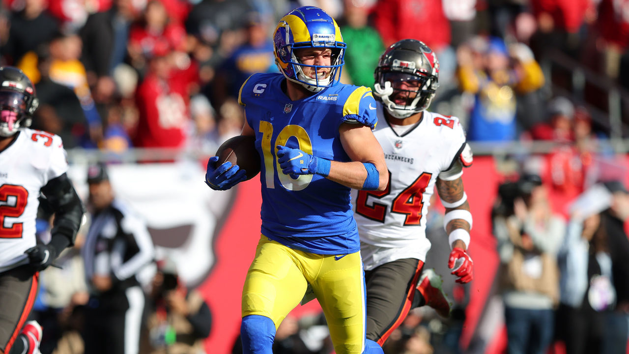TAMPA, FLORIDA - JANUARY 23: Cooper Kupp #10 of the Los Angeles Rams runs the ball into the end zone for a touchdown in the second quarter of the game against the Tampa Bay Buccaneers in the NFC Divisional Playoff game at Raymond James Stadium on January 23, 2022 in Tampa, Florida.