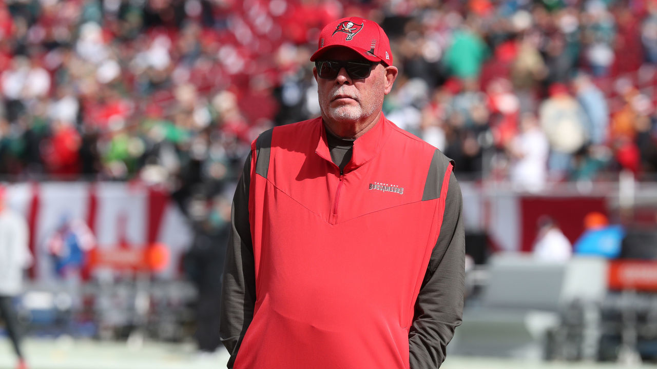 TAMPA, FL - JANUARY 16: Tampa Bay Buccaneers Head Coach Bruce Arians watches his team trot onto the field before the NFL Wild Card game between the Philadelphia Eagles and the Tampa Bay Buccaneers on January 16, 2022 at Raymond James Stadium in Tampa, Florida.