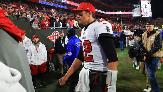 TAMPA, FLORIDA - JANUARY 23: Tom Brady #12 of the Tampa Bay Buccaneers reacts after being defeated by the Los Angeles Rams 30-27 in the NFC Divisional Playoff game at Raymond James Stadium on January 23, 2022 in Tampa, Florida.