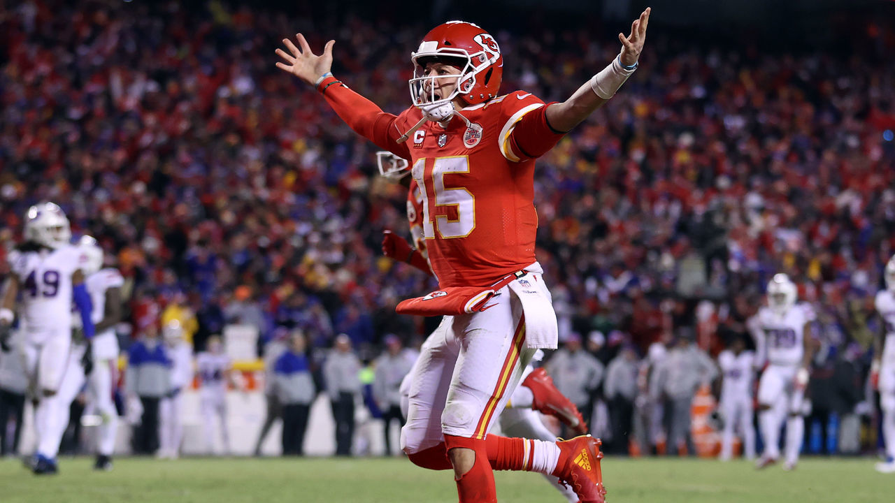 KANSAS CITY, MISSOURI - JANUARY 23: Patrick Mahomes #15 of the Kansas City Chiefs celebrates a touchdown scored by Tyreek Hill #10 against the Buffalo Bills during the fourth quarter in the AFC Divisional Playoff game at Arrowhead Stadium on January 23, 2022 in Kansas City, Missouri.
