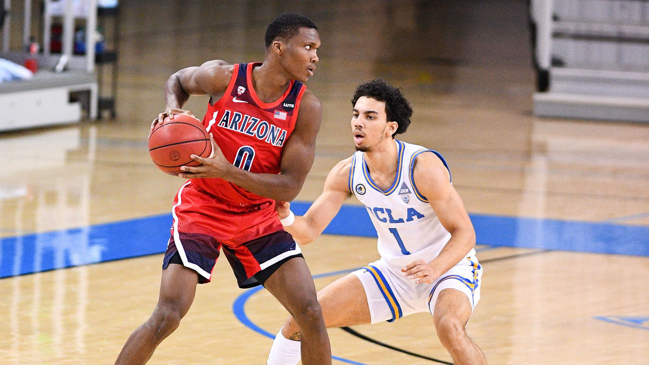 LOS ANGELES, CA - FEBRUARY 18: Arizona Wildcats guard Bennedict Mathurin (0) defended closely by UCLA Bruins guard Jules Bernard (1) during a game between the Arizona Wildcats and the UCLA Bruins on February 18, 2021, at Pauley Pavilion in Los Angeles, CA. The game was played without fans due to the COVID-19 pandemic.