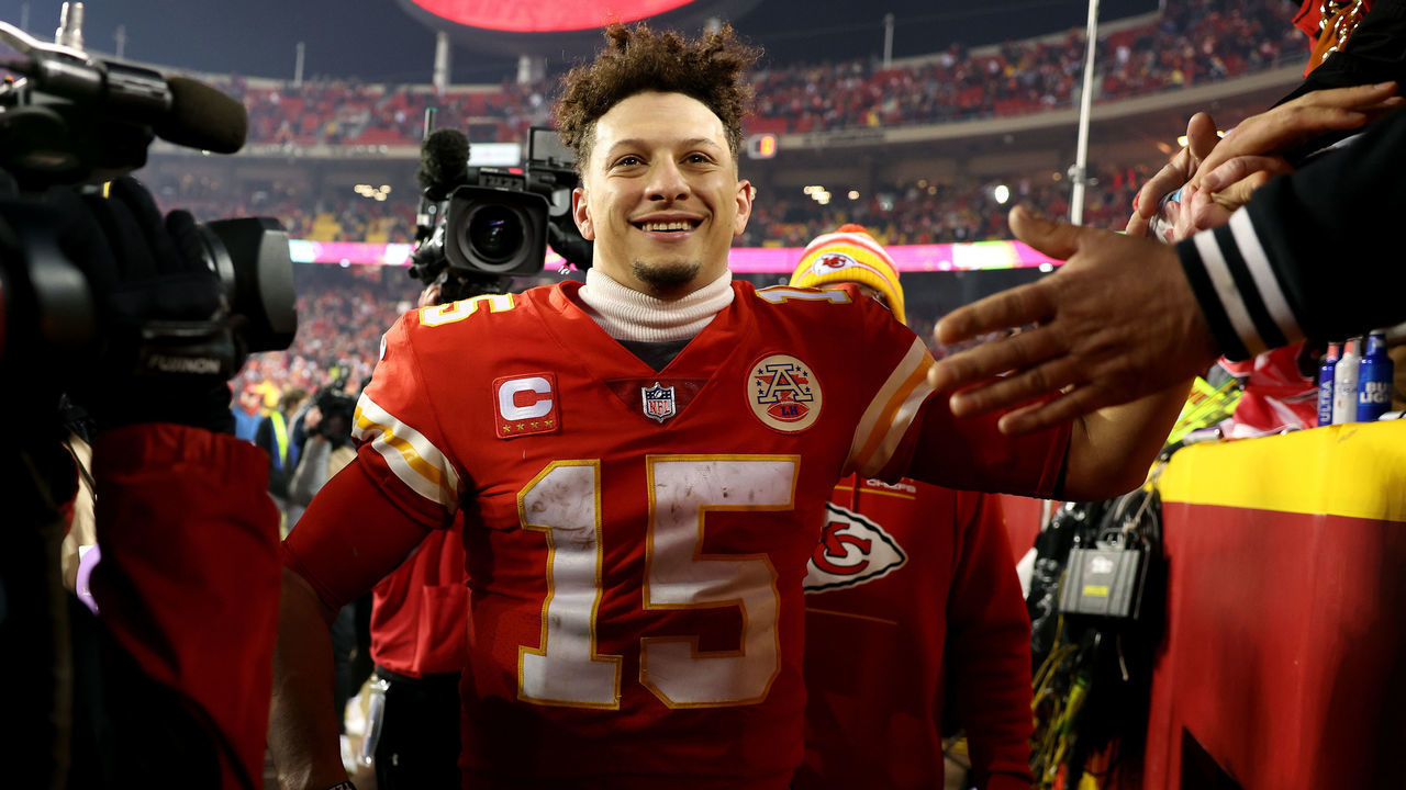 KANSAS CITY, MISSOURI - JANUARY 23: Patrick Mahomes #15 of the Kansas City Chiefs celebrates with fans after defeating the Buffalo Bills in the AFC Divisional Playoff game at Arrowhead Stadium on January 23, 2022 in Kansas City, Missouri. The Kansas City Chiefs defeated the Buffalo Bills with a score of 4 to 36.