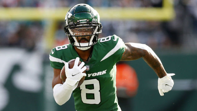 EAST RUTHERFORD, NEW JERSEY - NOVEMBER 21: (NEW YORK DAILIES OUT) Elijah Moore #8 of the New York Jets in action against the Miami Dolphins at MetLife Stadium on November 21, 2021 in East Rutherford, New Jersey. The Dolphins defeated the Jets 24-17.