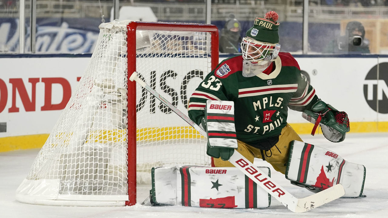 MINNEAPOLIS, MN - JANUARY 01: Minnesota Wild Goalie Cam Talbot (33) tracks the puck during the 2022 NHL Winter Classic between the St. Louis Blues and the Minnesota Wild on January 1, 2022 at Target Field in Minneapolis, Minnesota.