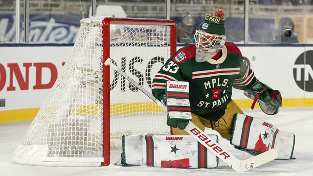 MINNEAPOLIS, MN - JANUARY 01: Minnesota Wild Goalie Cam Talbot (33) tracks the puck during the 2022 NHL Winter Classic between the St. Louis Blues and the Minnesota Wild on January 1, 2022 at Target Field in Minneapolis, Minnesota.