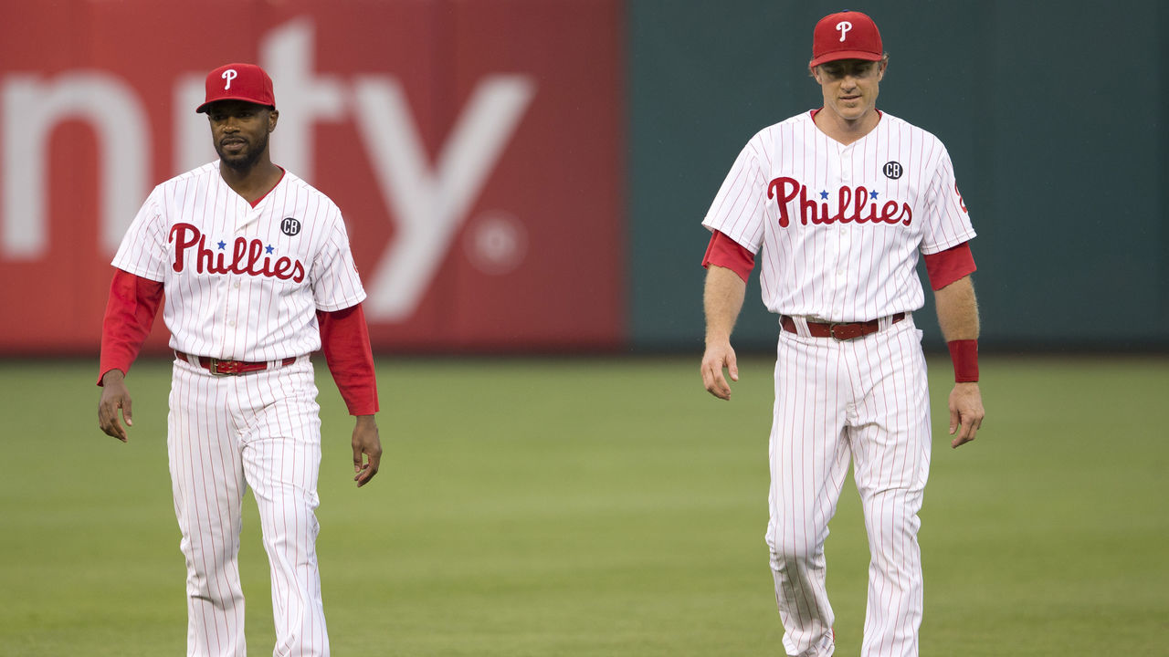PHILADELPHIA, PA - AUGUST 23: Shortstop Jimmy Rollins #11 and second baseman Chase Utley #26 of the Philadelphia Phillies warm up prior to the game against the St. Louis Cardinals on August 23, 2014 at Citizens Bank Park in Philadelphia, Pennsylvania.
