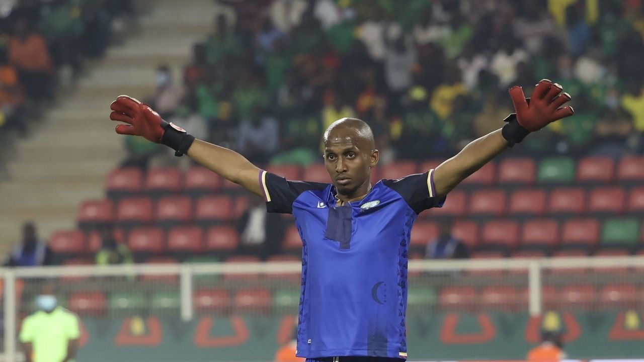 YAOUNDE, CAMEROON - JANUARY 24: Comoros' left back player Chaker Alhadhur is seen during 2021 Africa Cup of Nations last 16 soccer match between Cameroon and Comoros at Paul Biya Stadium in Yaounde, Cameroon on January 24, 2022. In the Comoros team, 2 goalkeepers were Covid-19 positive and the third goalkeeper was injured. And left-back player Chaker Alhadhur had to be a goalkeeper. Alhadhur, who had to wear the goalkeeper jersey, wore the number 3 jersey, which was written with tape on the number 16 jersey.