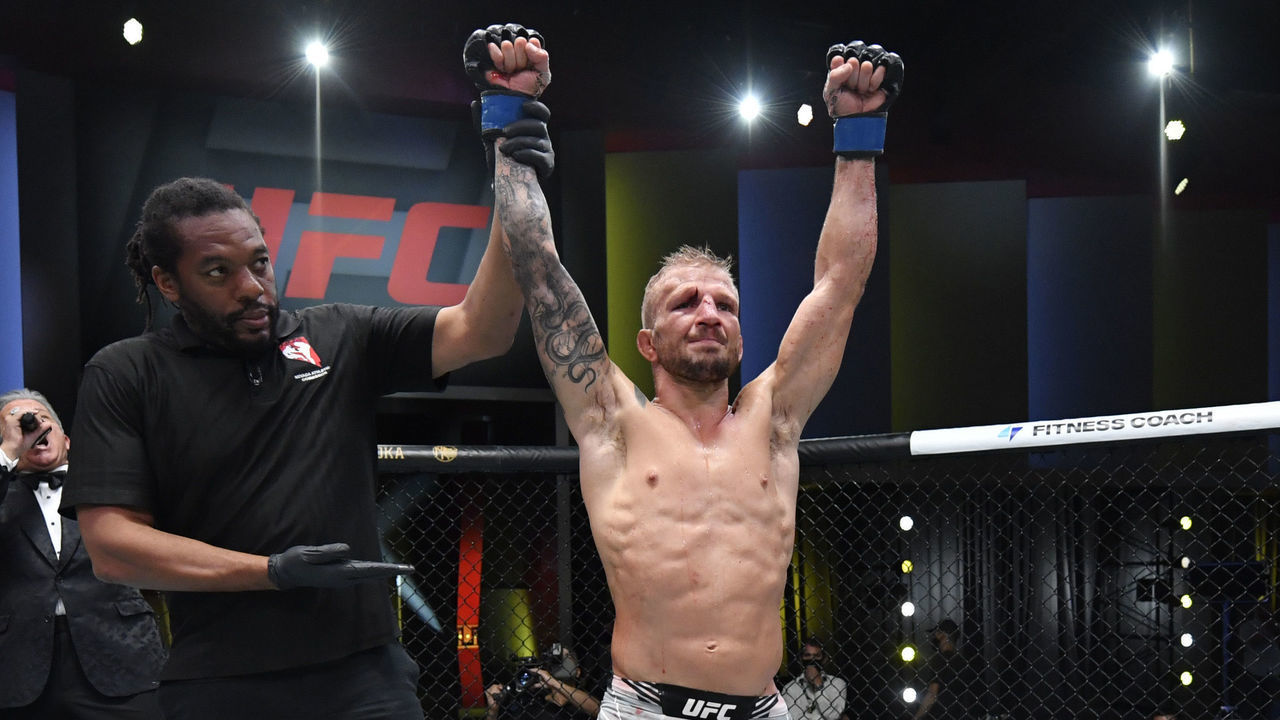 LAS VEGAS, NEVADA - JULY 24: T.J. Dillashaw reacts after his split-decision victory over Corey Sandhagen in their bantamweight fight during the UFC Fight Night event at UFC APEX on July 24, 2021 in Las Vegas, Nevada.