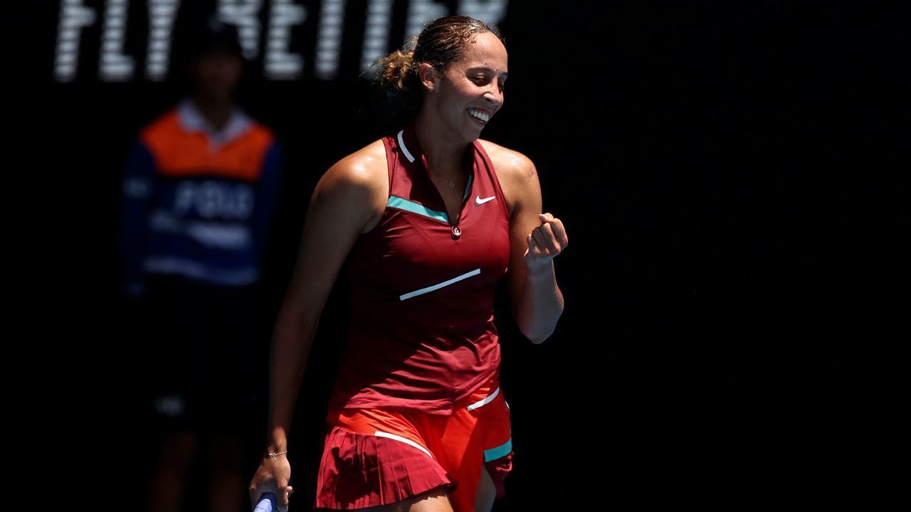 Madison Keys of the US celebrates after winning a match against Czech Republic's Barbora Krejcikova during their women's singles quarter-final match on day nine of the Australian Open tennis tournament in Melbourne on January 25, 2022. - -- IMAGE RESTRICTED TO EDITORIAL USE - STRICTLY NO COMMERCIAL USE --