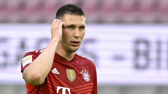 COLOGNE, GERMANY - JANUARY 15: Niklas Suele of Bayern Muenchen looks on during the Bundesliga match between 1. FC Köln and FC Bayern München at RheinEnergieStadion on January 15, 2022 in Cologne, Germany.