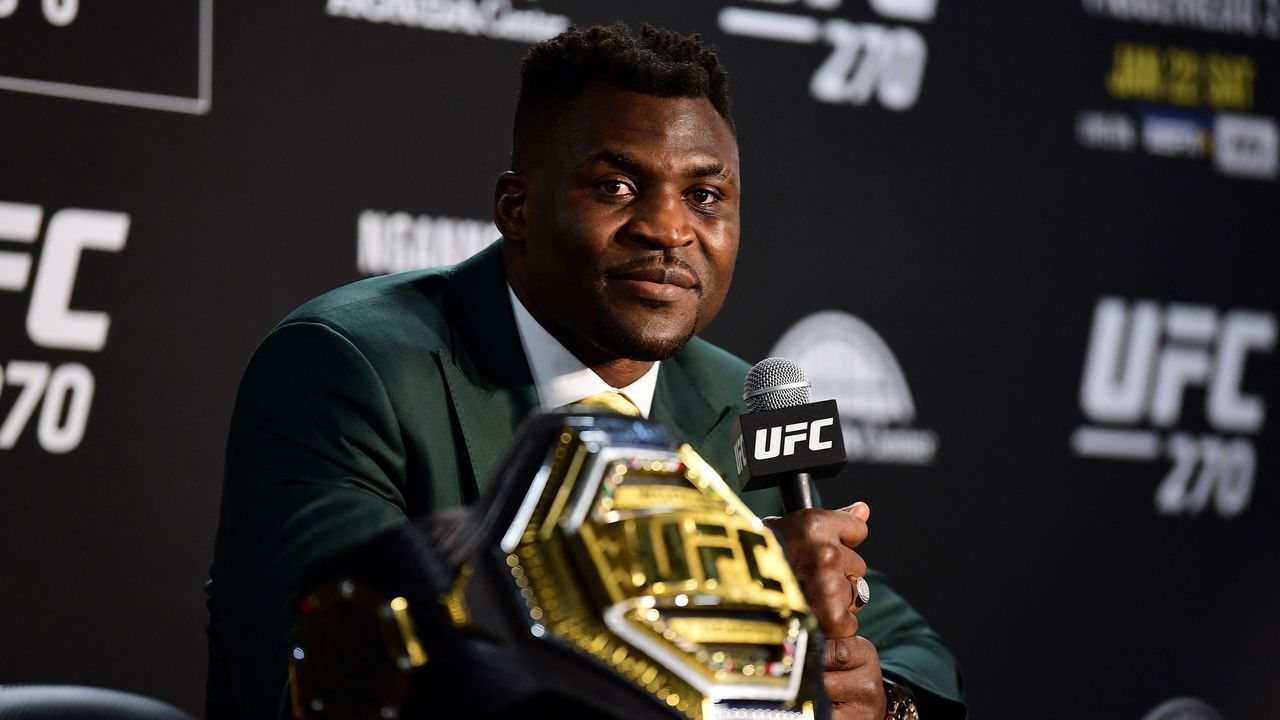 Champion Cameroon's Francis Ngannou takes questions in the press room after defeating French Cyril Gane in their UFC 270 championship fight in Anaheim on January 22, 2022.