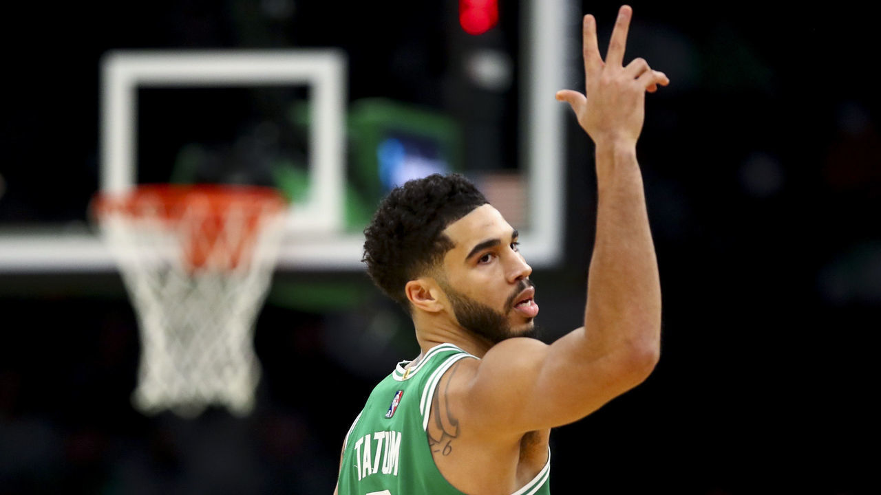 BOSTON, MA - JANUARY 25: Jayson Tatum #0 of the Boston Celtics reacts after hitting a three-point shot during game against the Sacramento Kings at TD Garden on January 25, 2022 in Boston, Massachusetts.