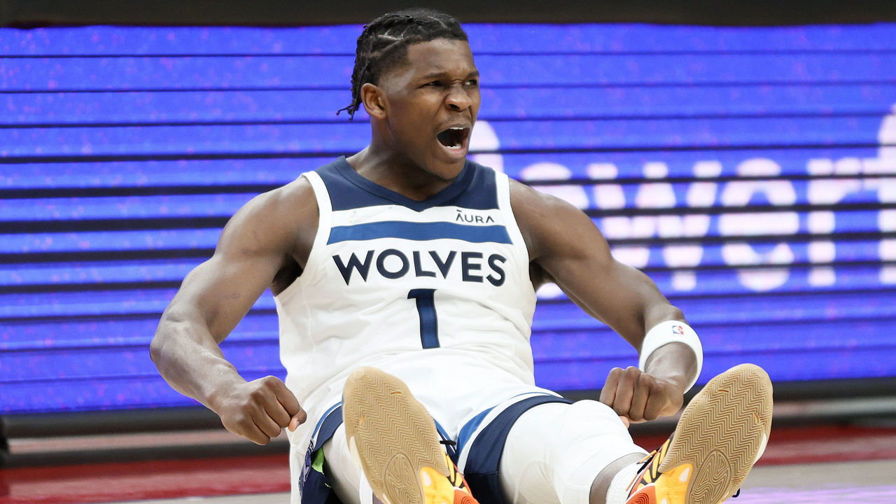 PORTLAND, OREGON - JANUARY 25: Anthony Edwards #1 of the Minnesota Timberwolves reacts after he was fouled on his three point basket against the Portland Trail Blazers during the fourth quarter at Moda Center on January 25, 2022 in Portland, Oregon. NOTE TO USER: User expressly acknowledges and agrees that, by downloading and/or using this photograph, User is consenting to the terms and conditions of the Getty Images License Agreement.