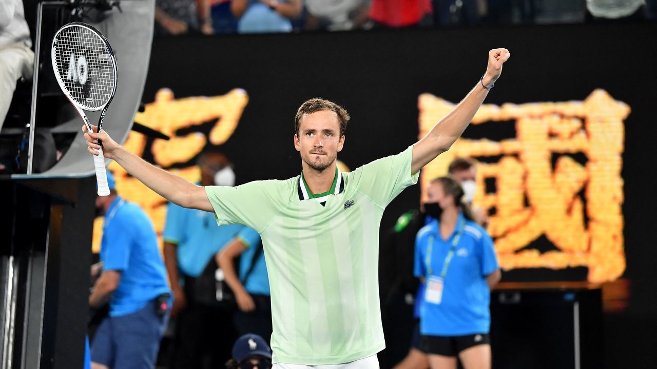 Russia's Daniil Medvedev celebrates after beating Canada's Felix Auger-Aliassime in their men's singles quarter-final match at the Australian Open tennis tournament in Melbourne on January 27, 2022. - -- IMAGE RESTRICTED TO EDITORIAL USE - STRICTLY NO COMMERCIAL USE --