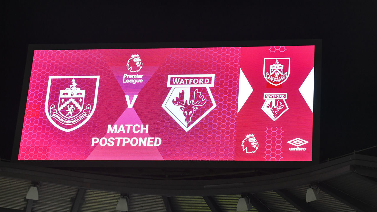 BURNLEY, ENGLAND - DECEMBER 15: The announcement of the games postponement is displayed on the big screen at Turf Moor prior to the Premier League match between Burnley and Watford at Turf Moor on December 15, 2021 in Burnley, England.
