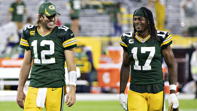 GREEN BAY, WI - SEPTEMBER 20: Aaron Rodgers #12 and Davante Adams #17 of the Green Bay Packers walk off the field together after a game against the Detroit Lions at Lambeau Field on September 20, 2021 in Green Bay, Wisconsin. The Packers defeated the Lions 35-17.