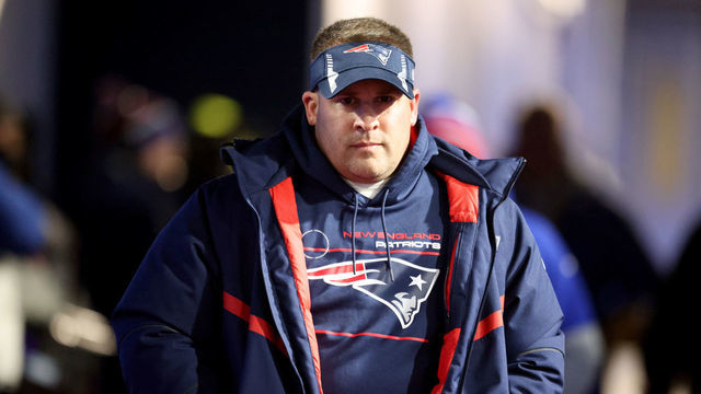 ORCHARD PARK, NEW YORK - DECEMBER 06: Offensive Coordinator and Quarterbacks Coach Josh McDaniels of the New England Patriots walks to the field prior to a game against the Buffalo Bills at Highmark Stadium on December 06, 2021 in Orchard Park, New York.