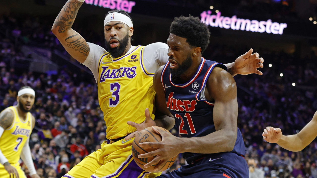 PHILADELPHIA, PENNSYLVANIA - JANUARY 27: Joel Embiid #21 of the Philadelphia 76ers drives against Anthony Davis #3 of the Los Angeles Lakers during the second quarter at Wells Fargo Center on January 27, 2022 in Philadelphia, Pennsylvania. NOTE TO USER: User expressly acknowledges and agrees that, by downloading and or using this photograph, User is consenting to the terms and conditions of the Getty Images License Agreement.
