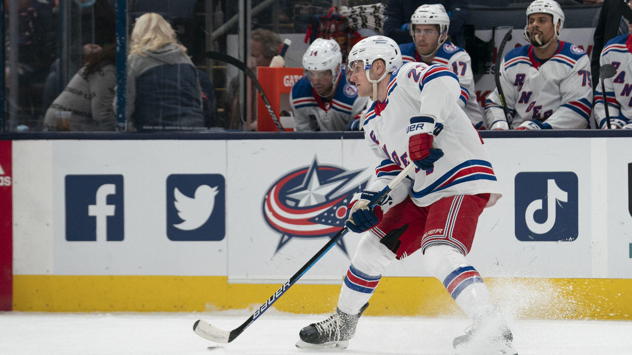 COLUMBUS, OH - JANUARY 27: New York Rangers defenseman Adam Fox #23 skates with the puck during the game between the Columbus Blue Jackets and the New York Rangers at Nationwide Arena in Columbus, Ohio on January 27, 2022.