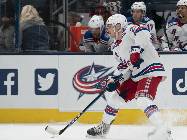 COLUMBUS, OH - JANUARY 27: New York Rangers defenseman Adam Fox #23 skates with the puck during the game between the Columbus Blue Jackets and the New York Rangers at Nationwide Arena in Columbus, Ohio on January 27, 2022.