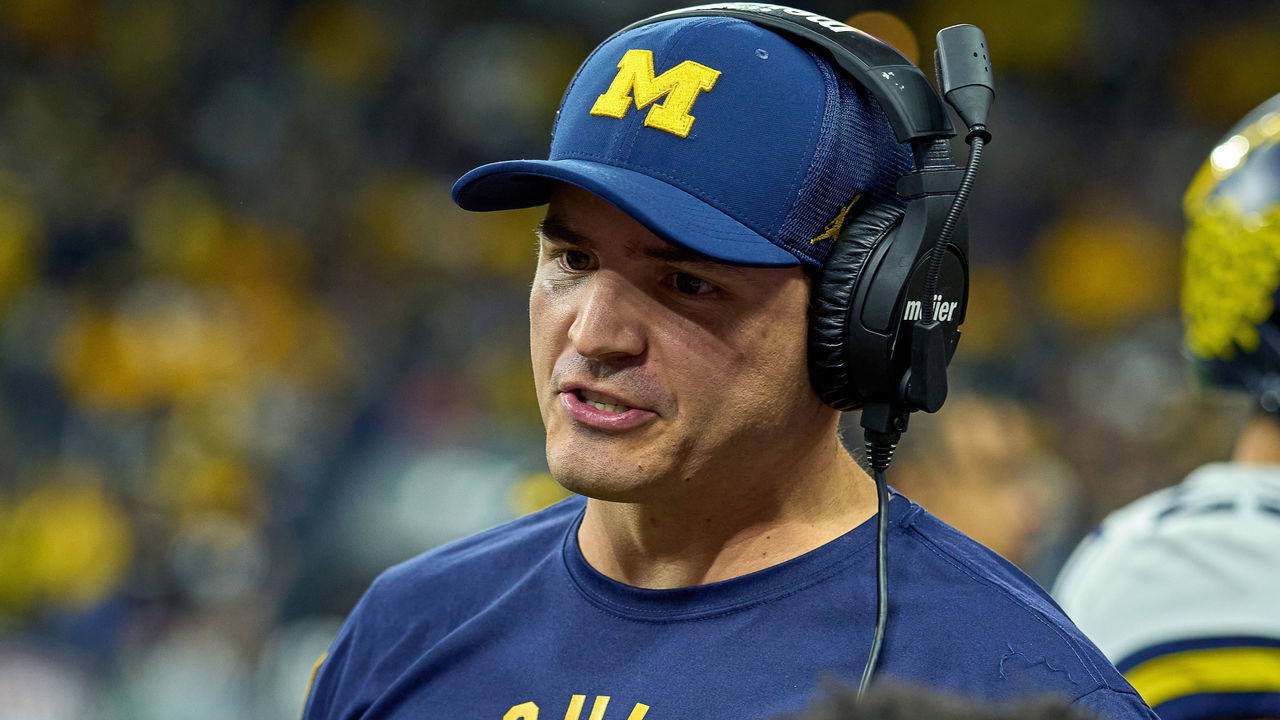 INDIANAPOLIS, IN - DECEMBER 04: Michigan Wolverines Defensive Coordinator Mike Macdonald looks on during the Big Ten Championship Game between the Iowa Hawkeyes and the Michigan Wolverines on December 04, 2021, at Lucas Oil Stadium, in Indianapolis, IL.