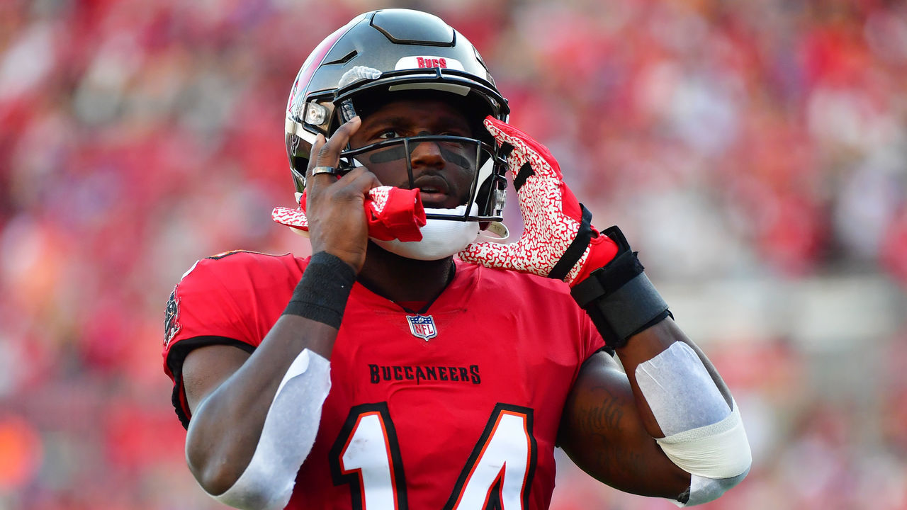 TAMPA, FLORIDA - DECEMBER 12: Chris Godwin #14 of the Tampa Bay Buccaneers adjusts his helmet prior to a game against the Buffalo Bills at Raymond James Stadium on December 12, 2021 in Tampa, Florida.