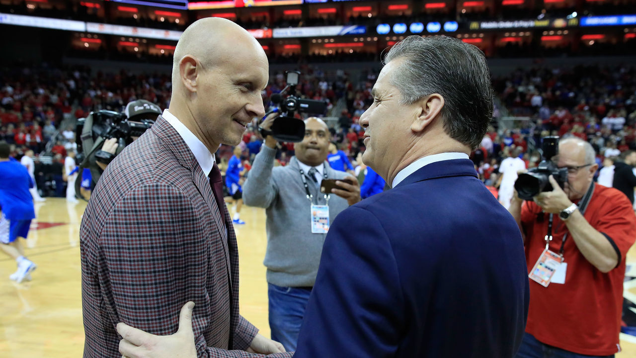 LOUISVILLE, KY - DECEMBER 29: Chris Mack the head coach of the the Louisville Cardinals and John Calipari the head coach of the Kentucky Wildcats talk before the game at KFC YUM! Center on December 29, 2018 in Louisville, Kentucky.