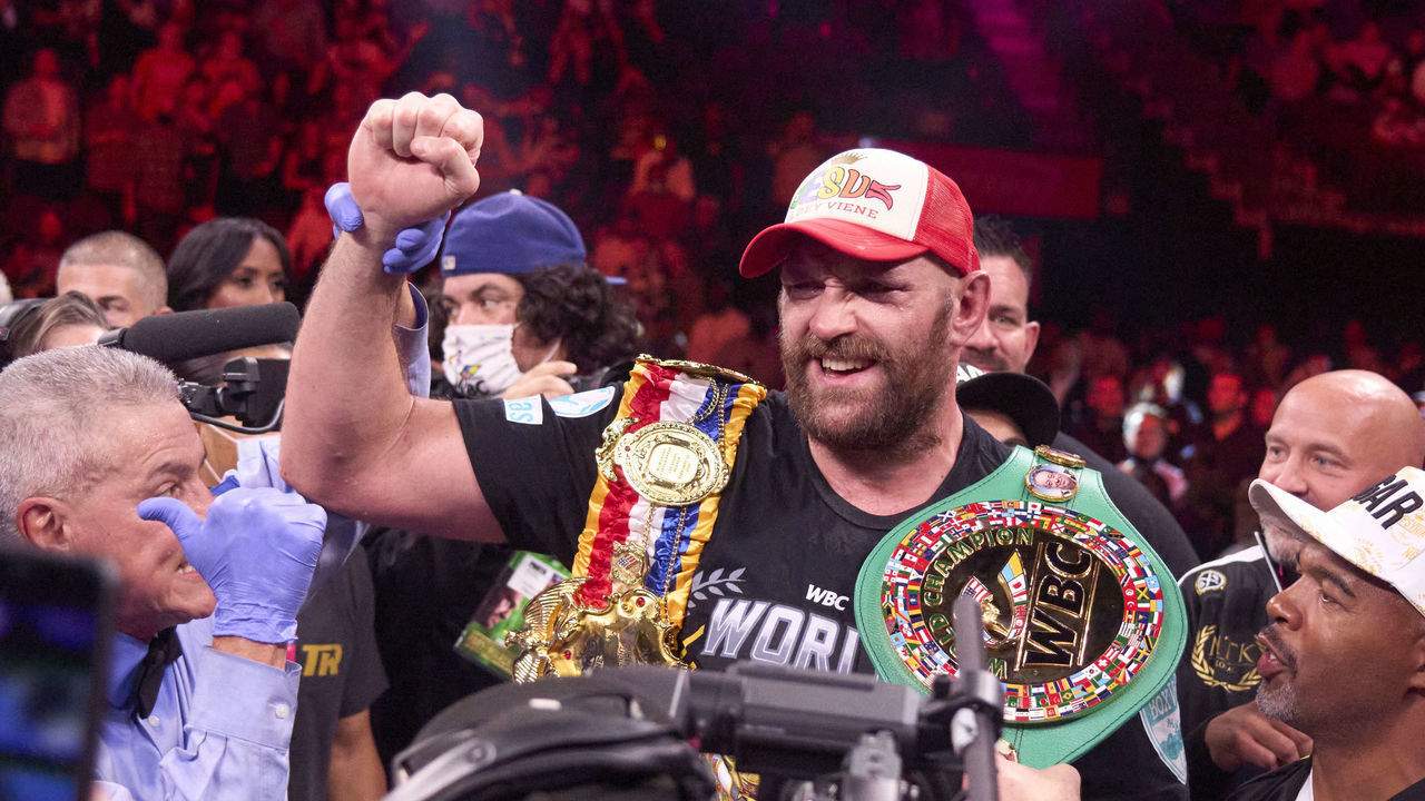Boxing: WBC Heavyweight Title: Tyson Fury victorious, wearing championship belts after knocking out Deontay Wilder at T-Mobile Arena. Paradise, NV 10/9/2021 CREDIT: Erick W. Rasco