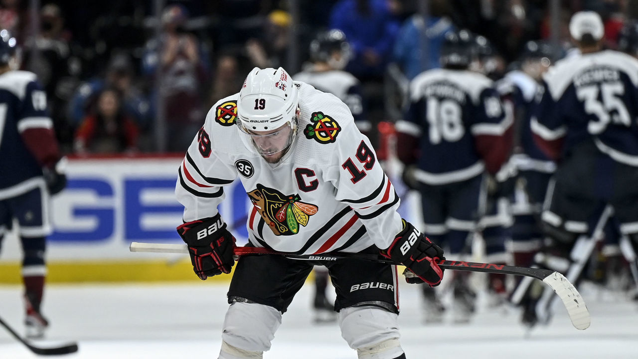 DENVER, CO - JANUARY 24: Jonathan Toews (19) of the Chicago Blackhawks and teammates react at the close of the third period of Colorado"u2019s 2-0 win on Monday, January 24, 2022.
