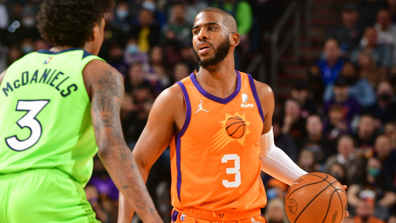 PHOENIX, AZ - JANUARY 28: Chris Paul #3 of the Phoenix Suns dribbles the ball during the game against the Minnesota Timberwolves on January 28, 2022 at Footprint Center in Phoenix, Arizona. Mandatory Copyright Notice: Copyright 2022 NBAE