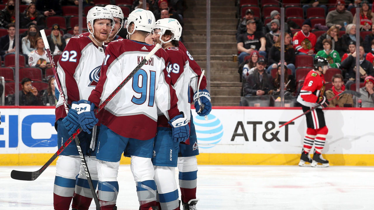 CHICAGO, ILLINOIS - JANUARY 28: Gabriel Landeskog #92 of the Colorado Avalanche celebrates with teammates after scoring against the Chicago Blackhawks in the third period at United Center on January 28, 2022 in Chicago, Illinois.