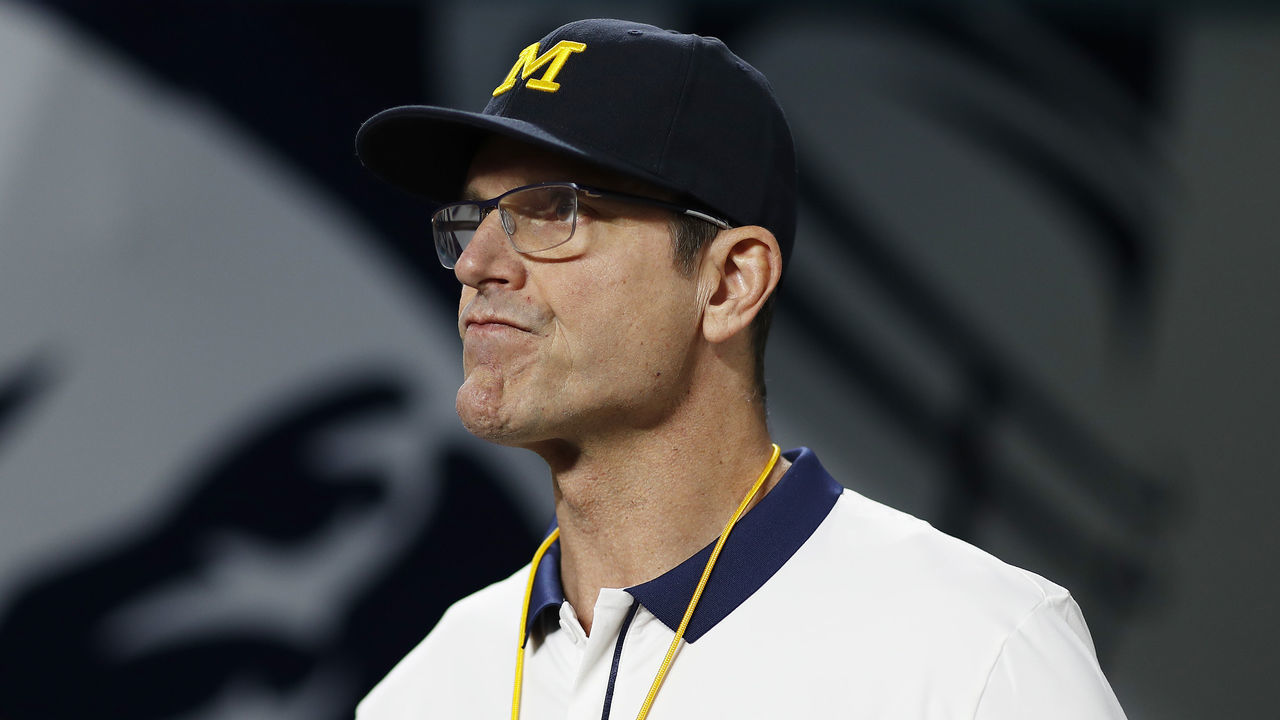 2MIAMI GARDENS, FLORIDA - DECEMBER 31: Head Coach Jim Harbaugh of the Michigan Wolverines looks on before the game against the Georgia Bulldogs in the Capital One Orange Bowl for the College Football Playoff semifinal game at Hard Rock Stadium on December 31, 2021 in Miami Gardens, Florida.