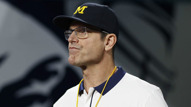 2MIAMI GARDENS, FLORIDA - DECEMBER 31: Head Coach Jim Harbaugh of the Michigan Wolverines looks on before the game against the Georgia Bulldogs in the Capital One Orange Bowl for the College Football Playoff semifinal game at Hard Rock Stadium on December 31, 2021 in Miami Gardens, Florida.