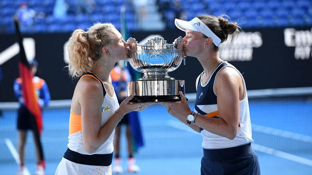 MELBOURNE, AUSTRALIA - JANUARY 30: Katerina Siniakova (L) and Barbora Krejcikova (R) of the Czech Republic pose with the trophy following their win in the womenâs doubles final against Anna Danilina of Kazakhstan and Beatriz Haddad Maia of Brazil at the Australian Open grand slam tennis tournament at Melbourne Park in Melbourne, Australia, 30 January 2022.